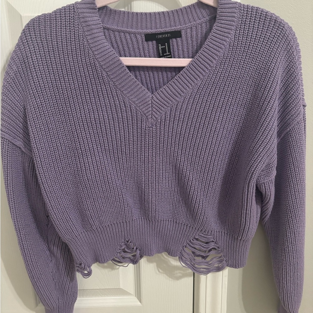 Distressed purple sweater